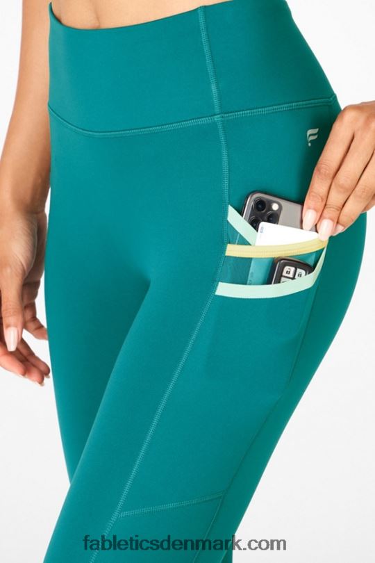 Fabletics Kvinder trinity højtaljet lomme 7/8 PNX2T1304 lavvandet/støvet blågrønt/guld