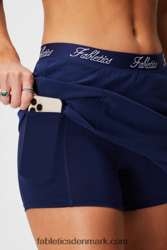 Fabletics Kvinder vævet lommenederdel med indbygget kort PNX2T626 kollegial flåde/kollegial flåde