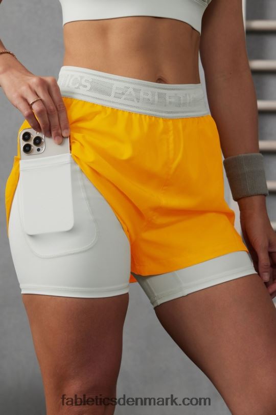 Fabletics Kvinder perforeret løb 5\" kort PNX2T596 eftermiddagssol/mintegrå/reflekterende sølv